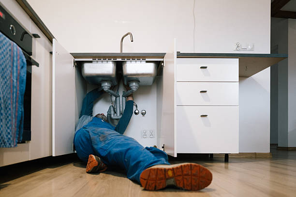 Professional Drain Cleaning technician working in Somerville, MA